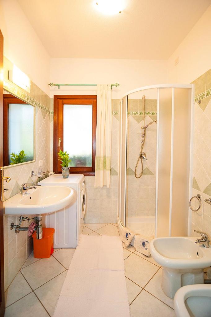 Appartamento a San Teodoro - Alloggio con giardino