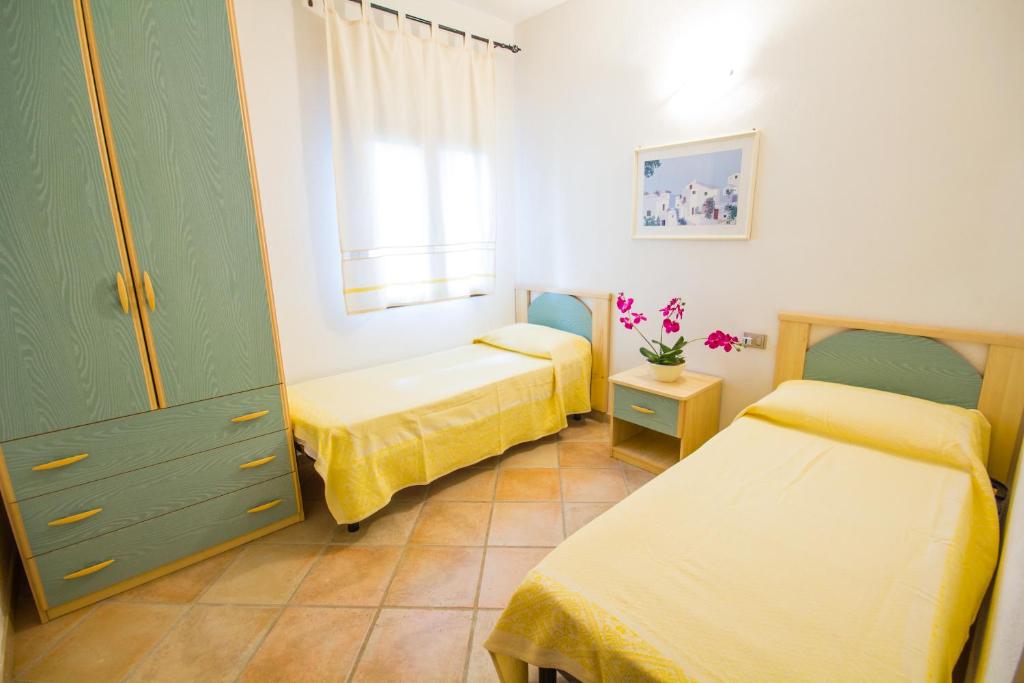Iris Houses a San Teodoro - Incantevoli Appartamenti