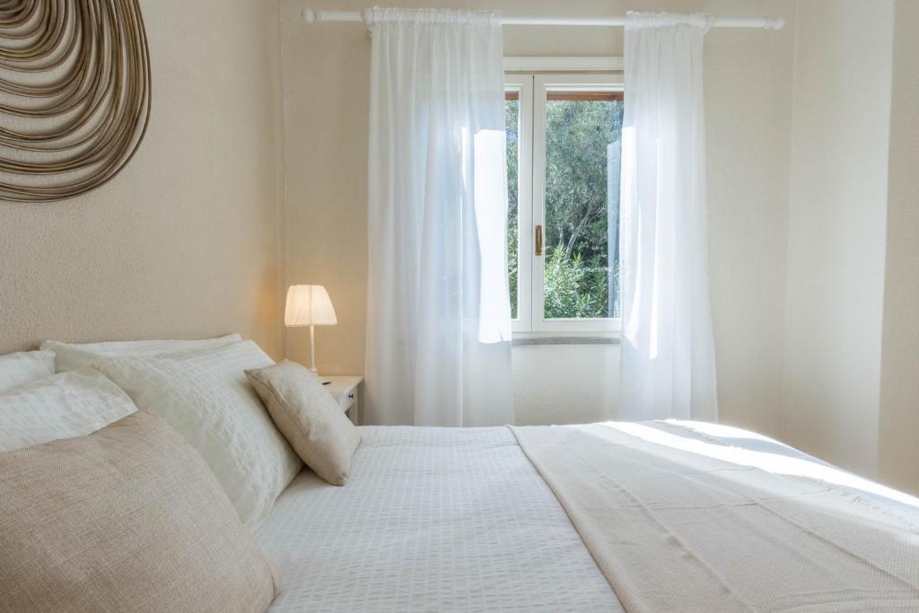 Villa Fronte Mare a Villasimius - Paradiso con Giardino