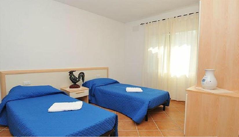 Gallo Spot a San Teodoro - B&B vicino a La Cinta
