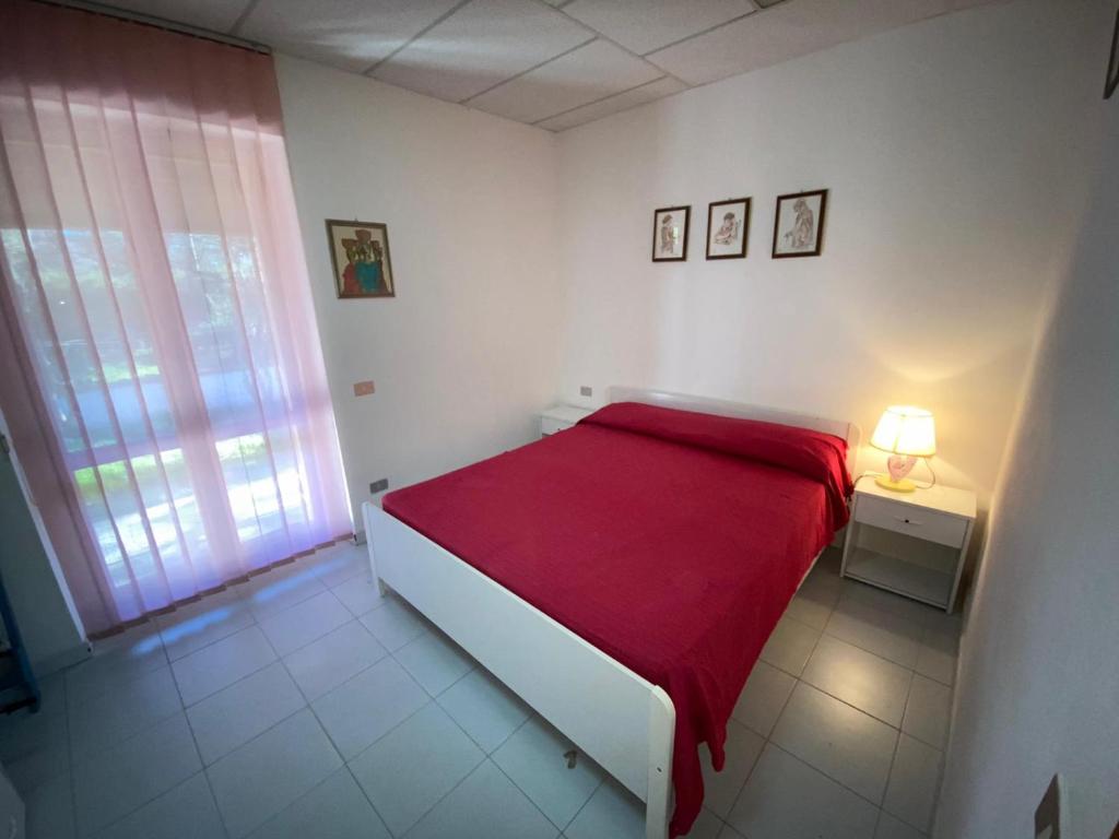 Rosa La Cinta a San Teodoro - Comodo appartamento centrale