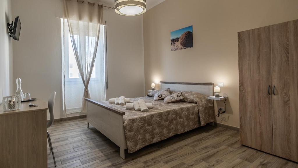 BOSS Guest House ad Alghero - Confortevole B&B centrale