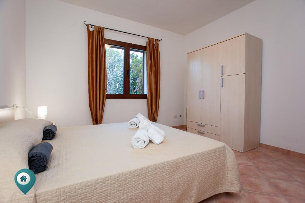 Arruli H1 a San Teodoro - Incantevole Casa con Giardino