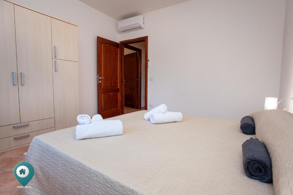 Arruli H1 a San Teodoro - Incantevole Casa con Giardino