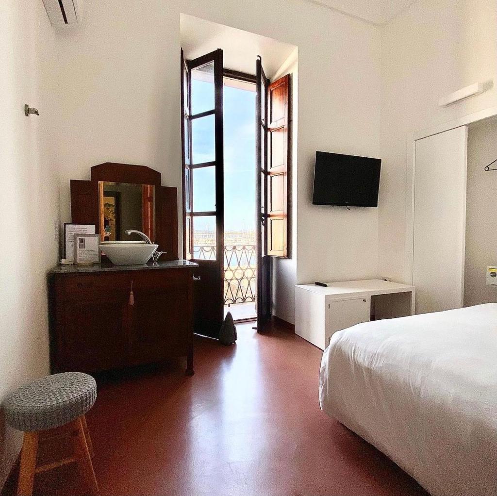 Palazzo Bolasco ad Alghero - Lussuoso apt storico sul porto