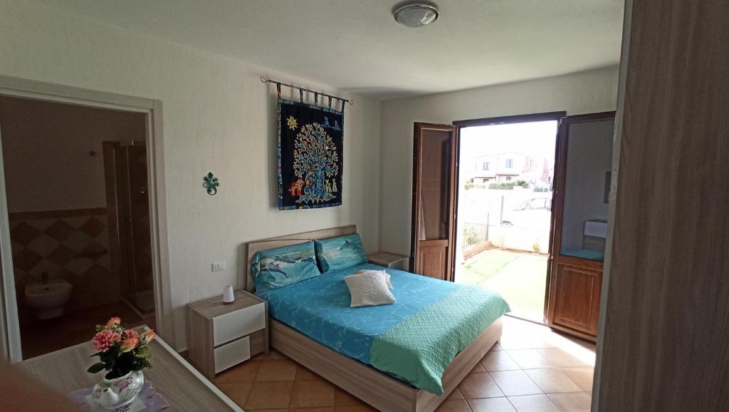 Casa Leon a Villasimius - Spazioso Appartamento con Giardino