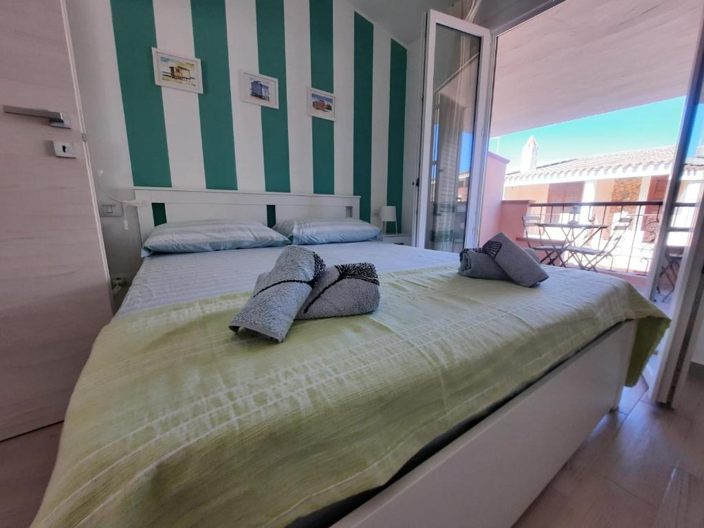 Casa Vittoria a Villasimius - Accogliente Appartamento con Balcone