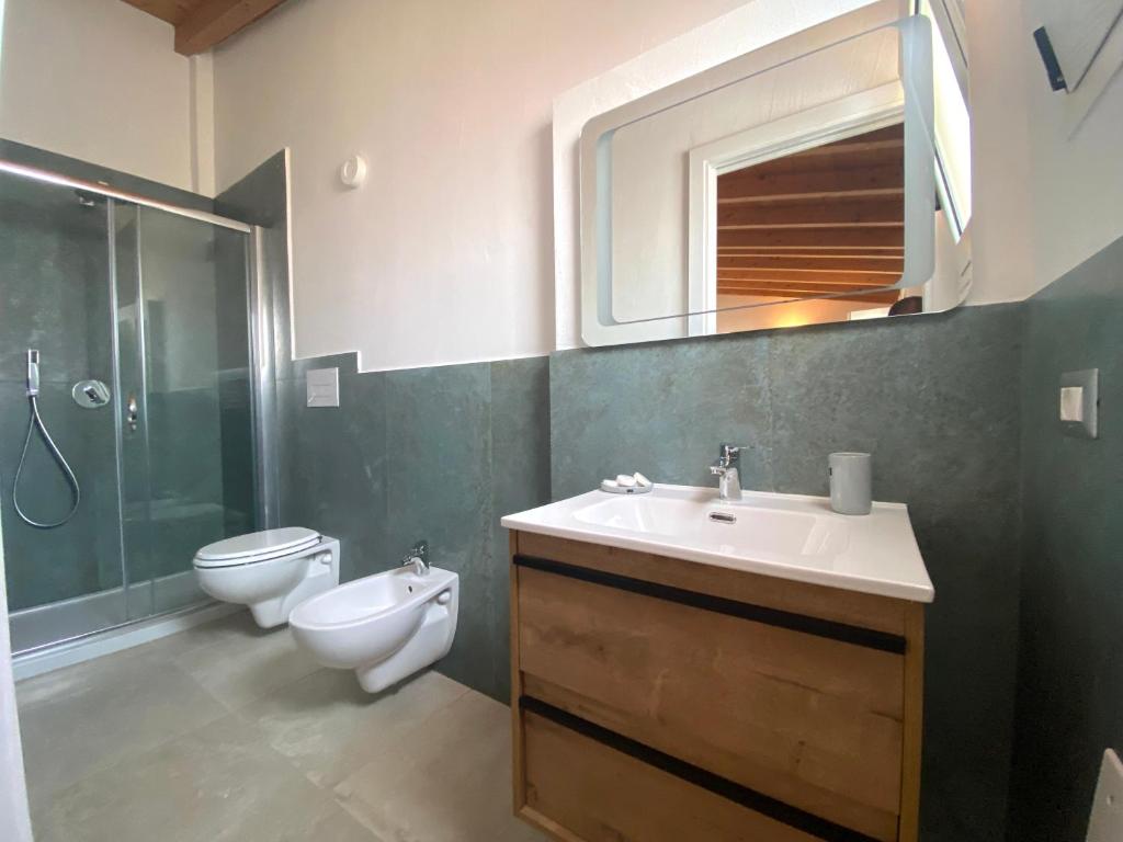 PUNTO ZERO ROOMS a San Teodoro - Nel Cuore del Centro