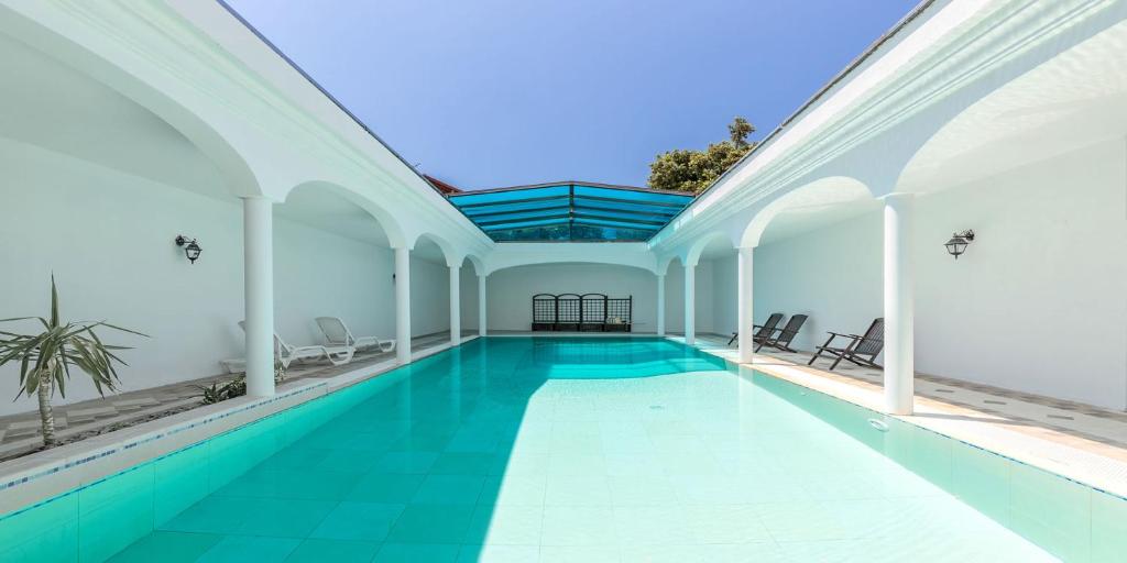 Appartamenti Bonsai - Alloggi con Piscina nel Centro