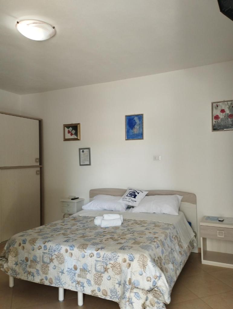 Zio Peppe a San Teodoro - Camere familiari in centro