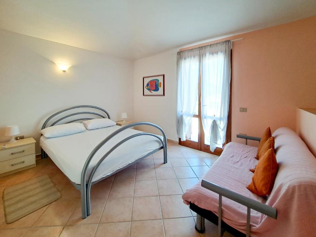Trilocale Aresula - Spazioso Appartamento con Balcone