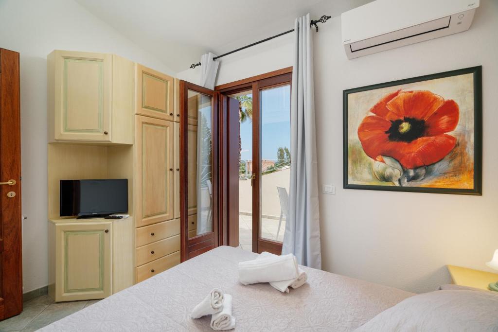 Rooms Tavolara a San Teodoro - Affittacamere Panoramico