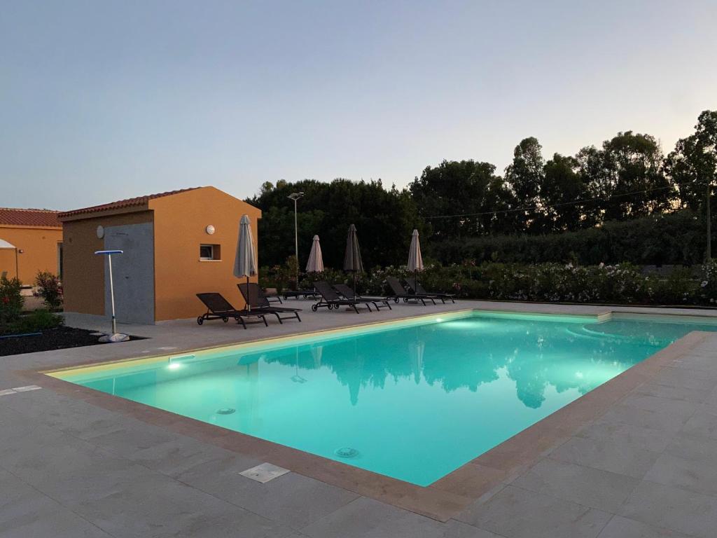 Maris Suite ad Alghero - Lussuoso Appartamento con Piscina