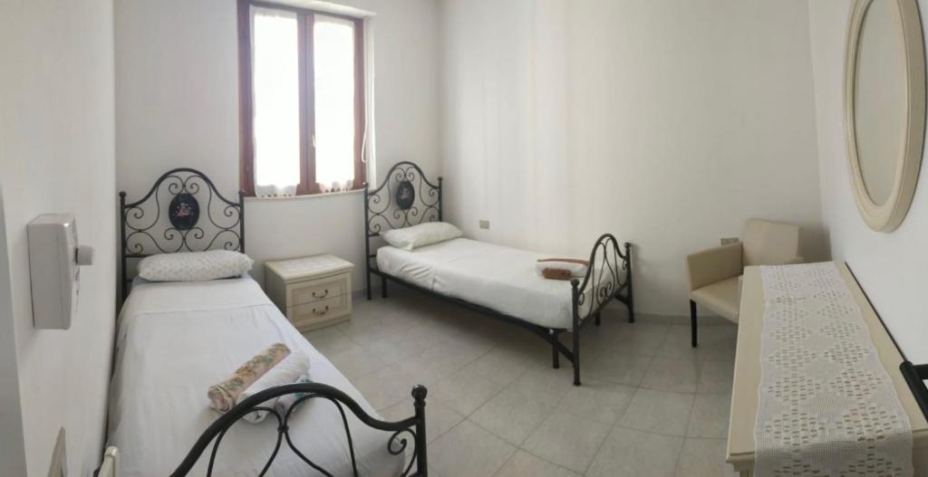 PM 15 ad Alghero - Elegante Appartamento Vicino alle Spiagge