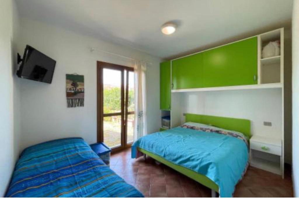 Villino a San Teodoro - Casa Vacanze con Giardino