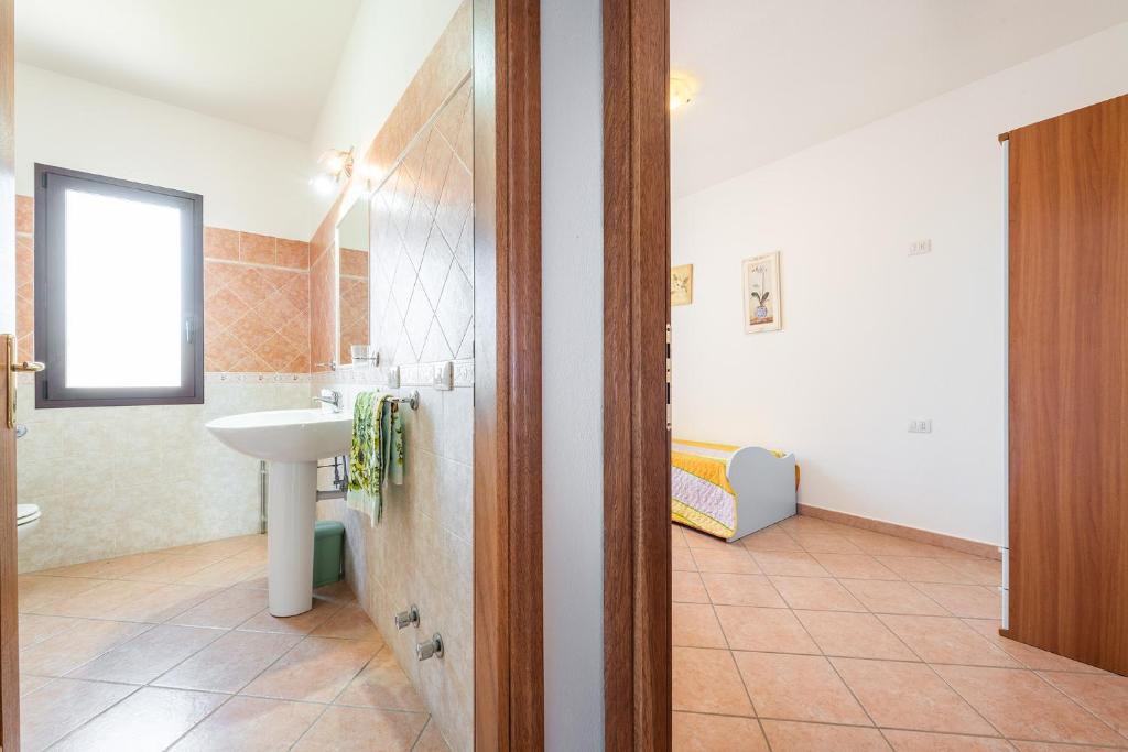 La Cinta D a San Teodoro - Comodo appartamento centrale