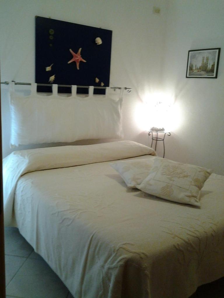 Robert House ad Alghero - Rilassante Appartamento con Giardino