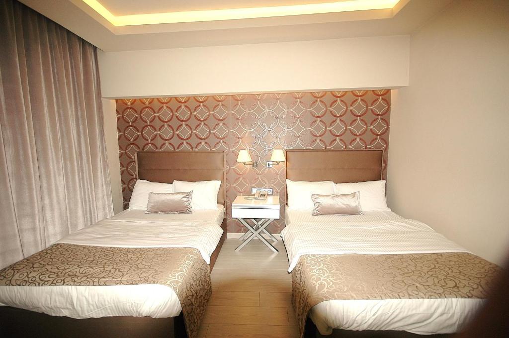 Kent Hotel - Dreibettzimmer