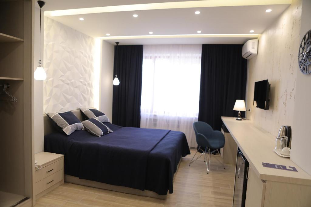 4Room Hotel - Quarto Duplo