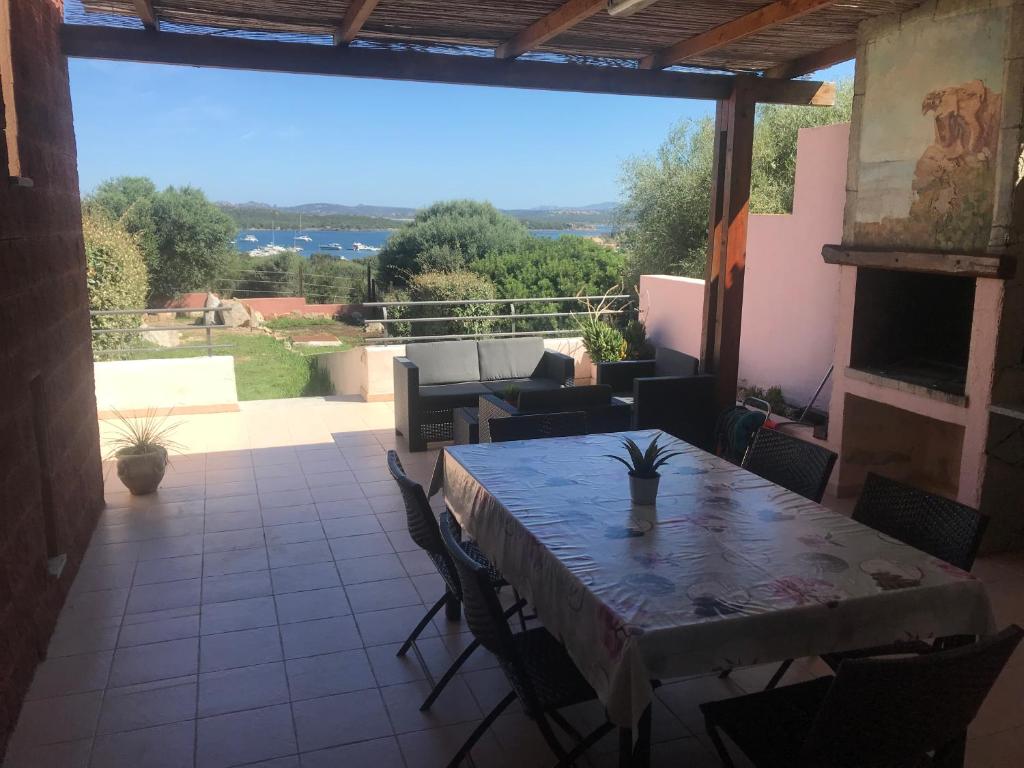 Villa a Schiera a Porto Pozzo - Lusso Vista Mare