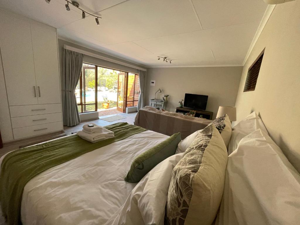 Olive Branch Cottage off grid - Deluxe Doppel- Oder Zweibettzimmer Mit Poolblick
