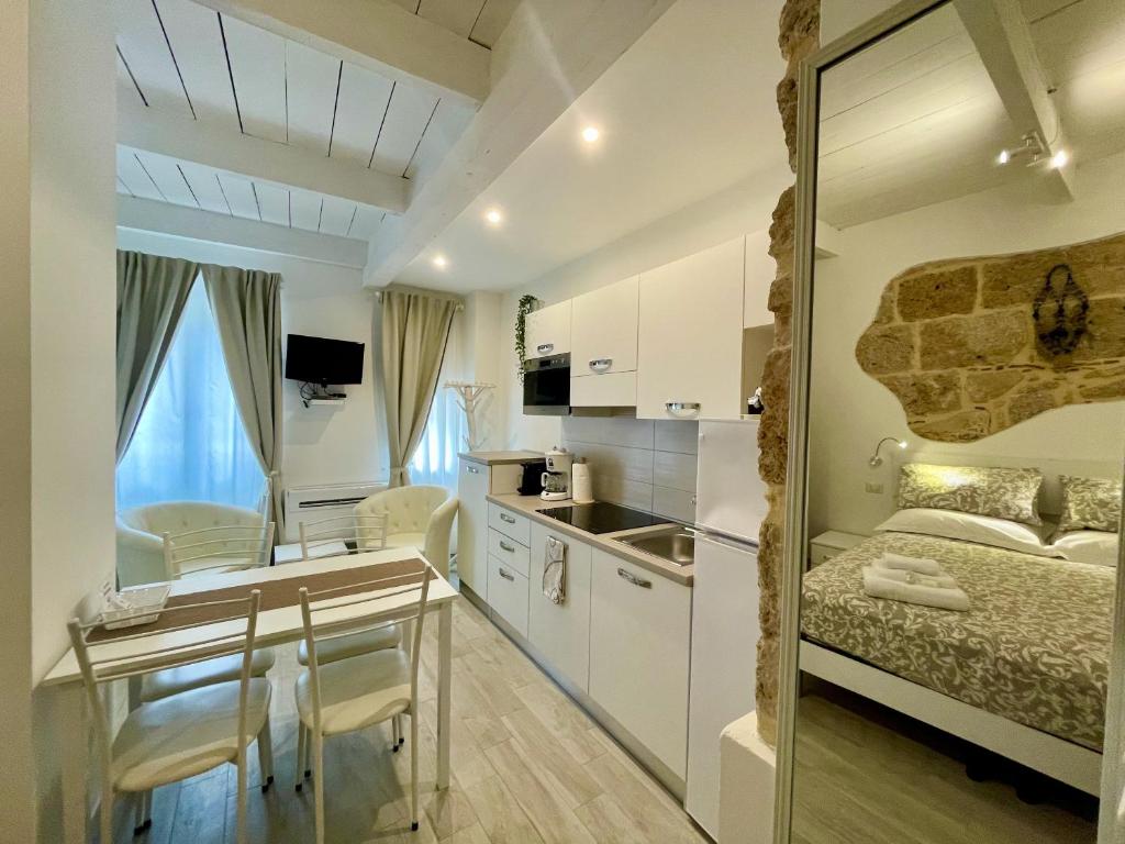 Protea House ad Alghero - Moderni Appartamenti Centrali