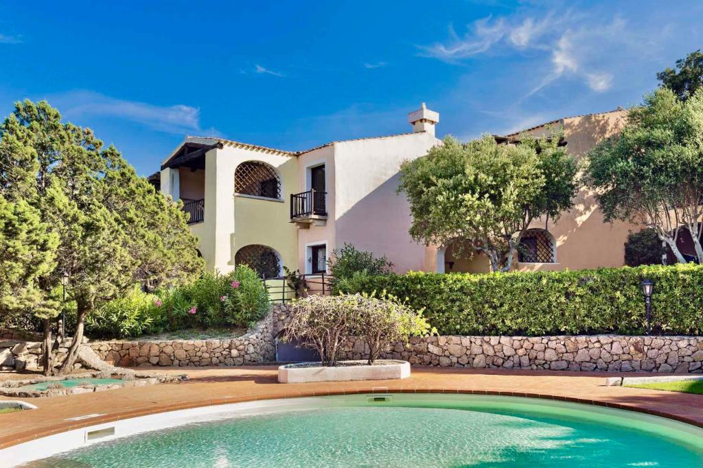 Apartment in Liscia di Vacca - Accogliente oasi con piscina