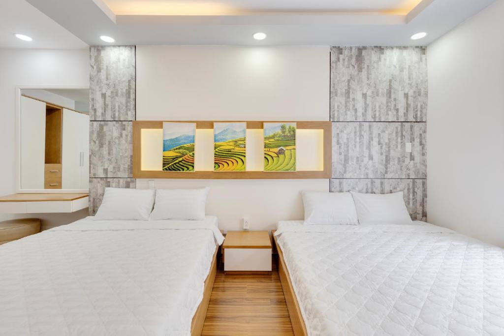 Saigon Authentic Hostel - FREE Alley Walking Tour, Fresh Daily Breakfast, Gym & Rooftop Billiard - جناح العائلة مع المَلْكِي