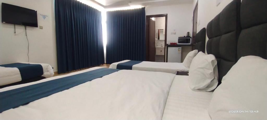 Happy Beach For Studio Rooms Apartment - غرفة رباعية مع عرض بحر
