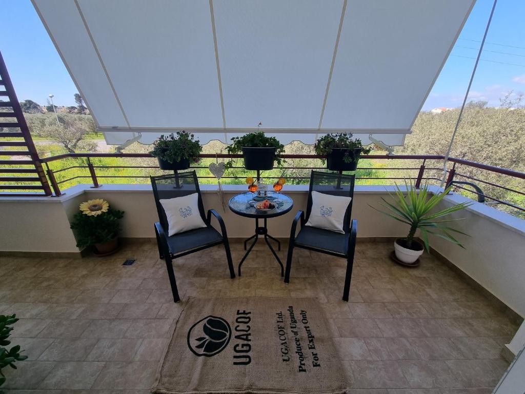 Ric's House ad Alghero - Spazioso appartamento con terrazza