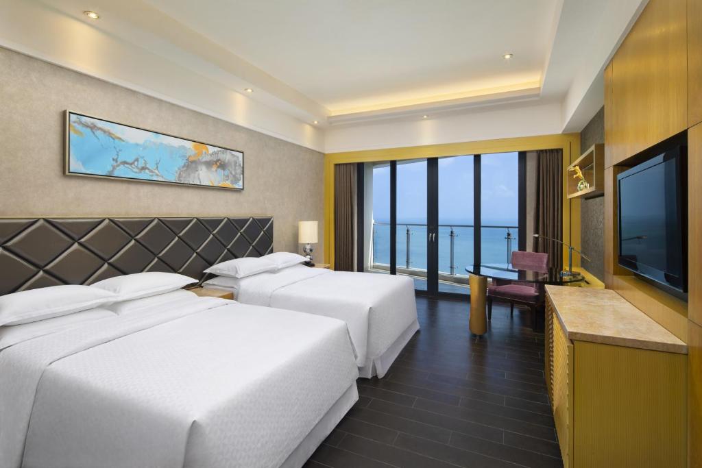 Four Points by Sheraton Hainan, Sanya - Premium Ocean View Zimmer, Gästezimmer, 2 Doppelzimmer, Meerblick, Hochgeschoss, Balkon