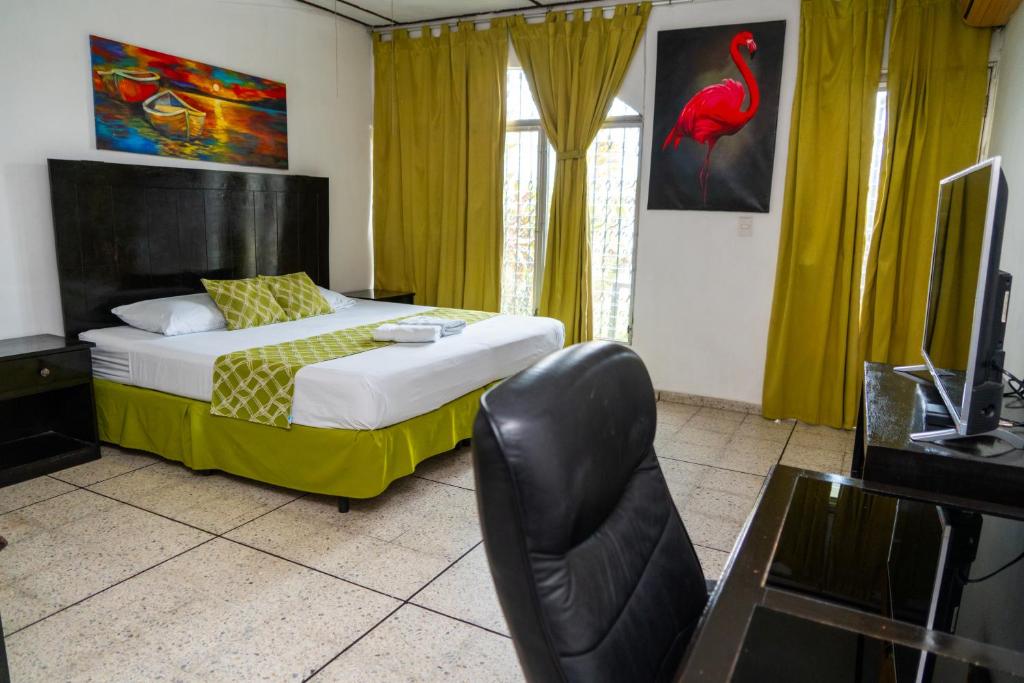 Suites & Apartments San Benito - Zona Rosa - テラスハウスと交わり合う