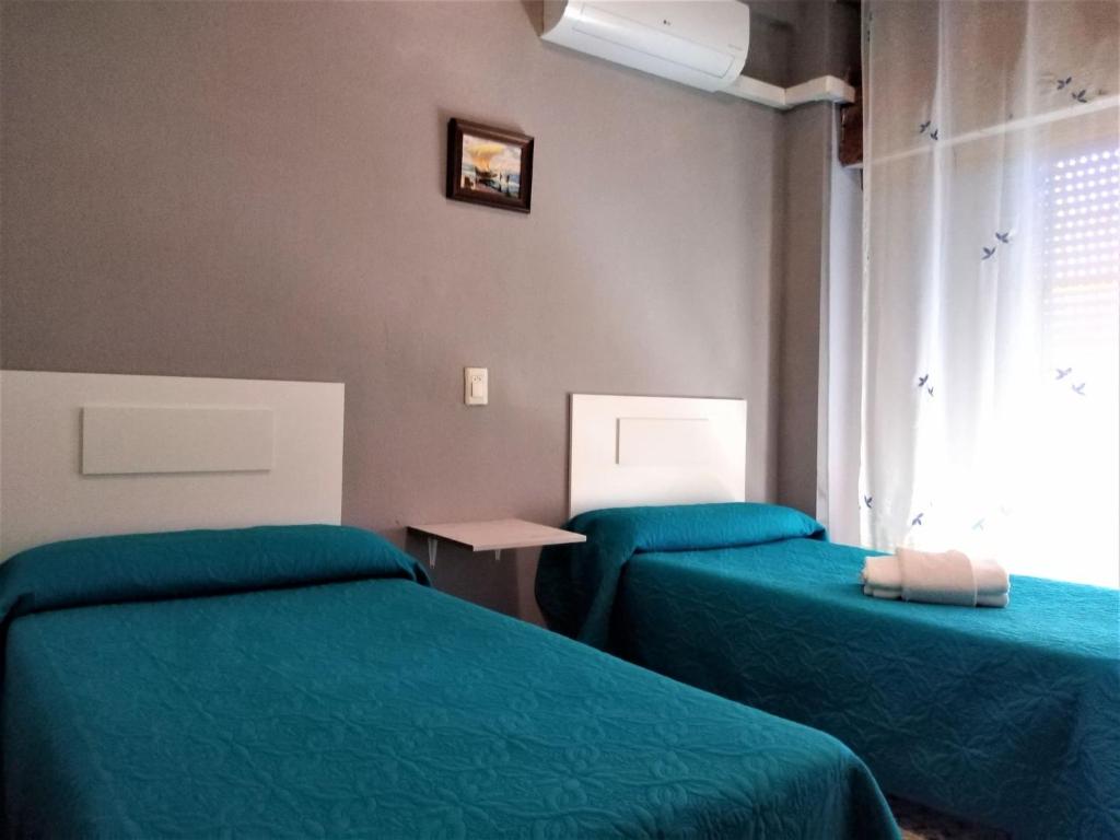 Habitaciones de Hostal a Primera linea de playa en Cullera