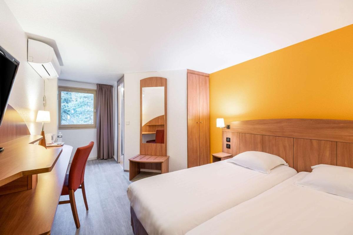 Comfort Hotel Grenoble Meylan - Housity