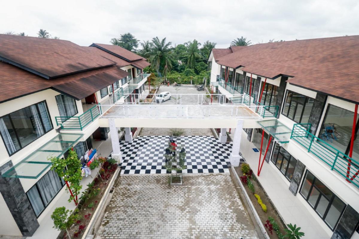 Suitetrails - RedDoorz Plus near Kualanamu Airport