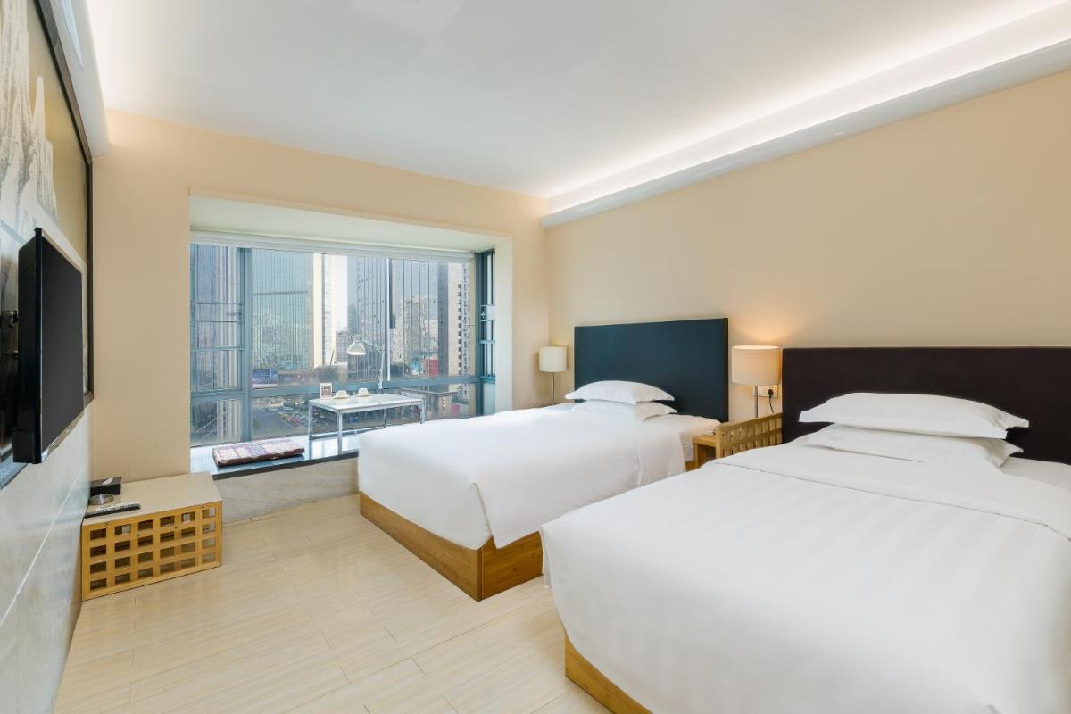 Guangzhou Timmy Hotel Apartment - Housity