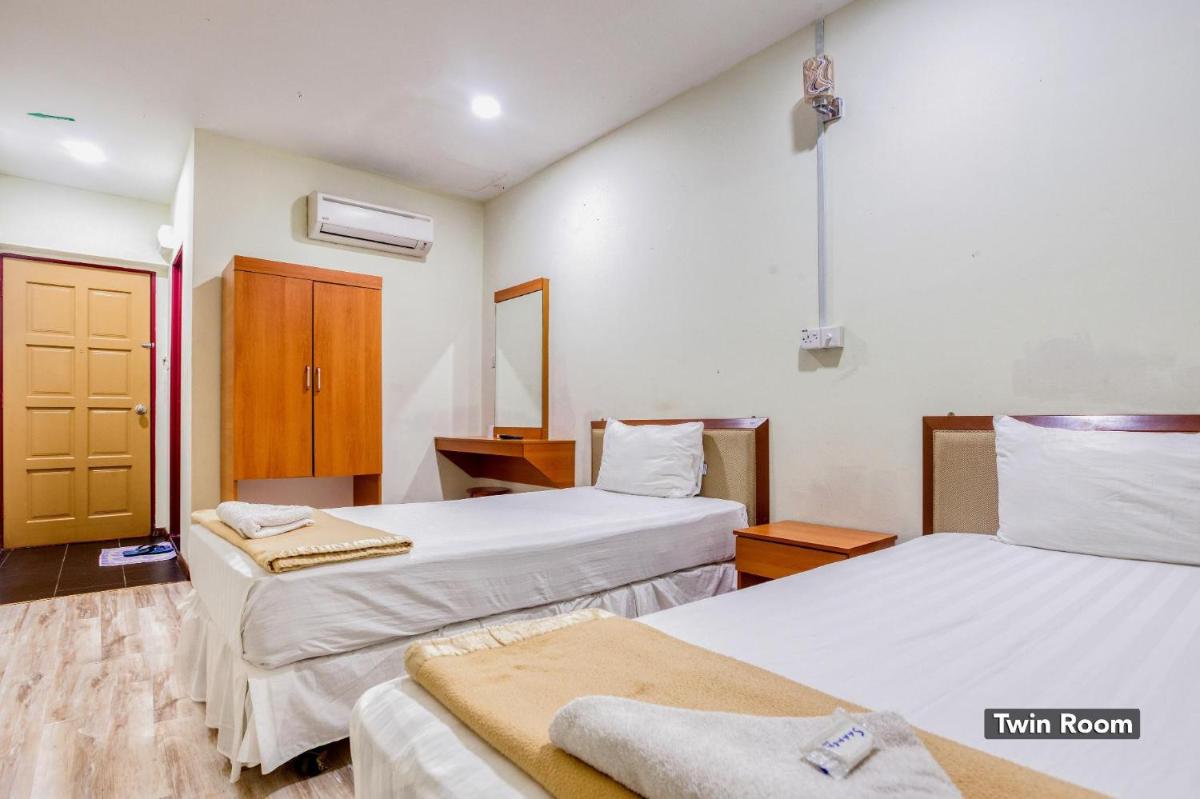 Hotel Sri Malim - Housity