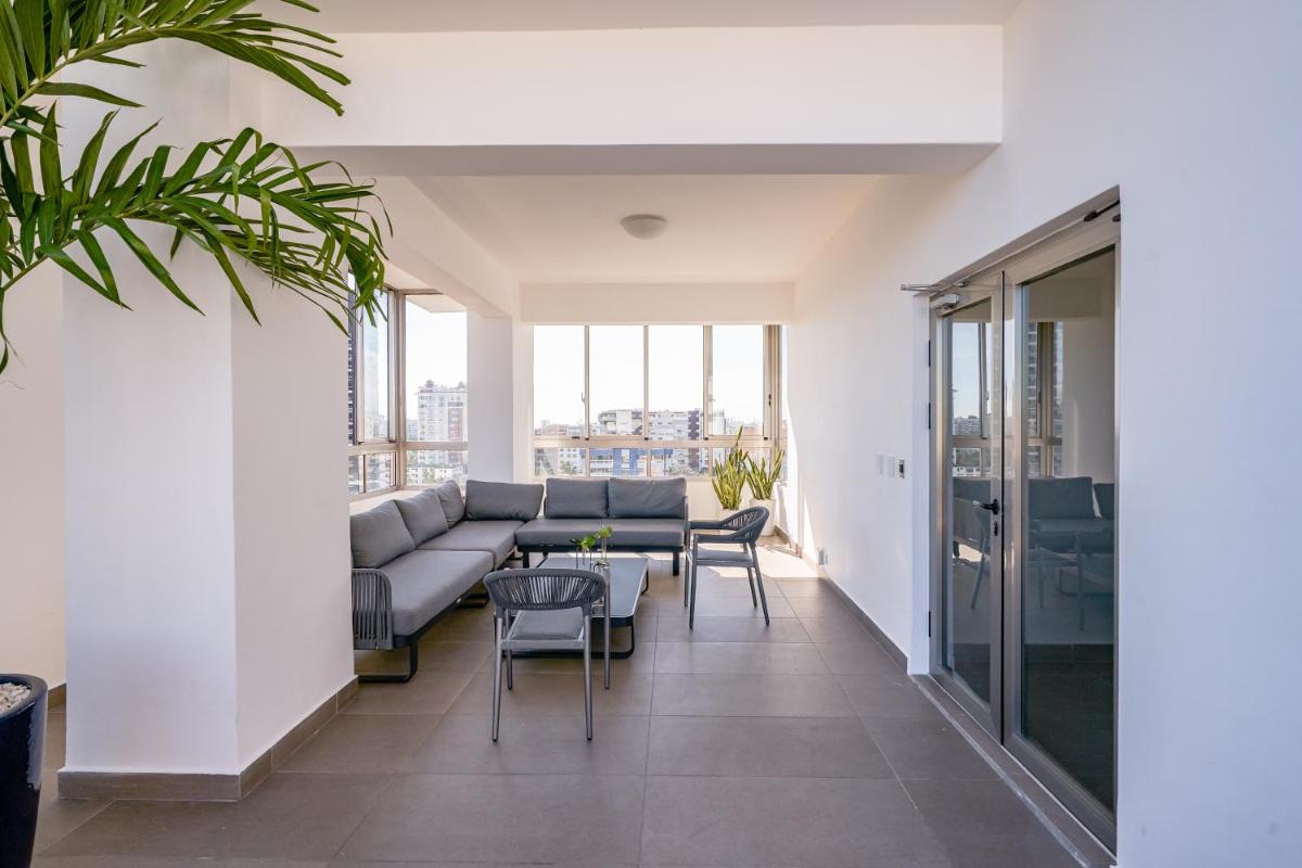 Suitetrails - Brand New Harmony Condo with Pool & Gym in La Julia