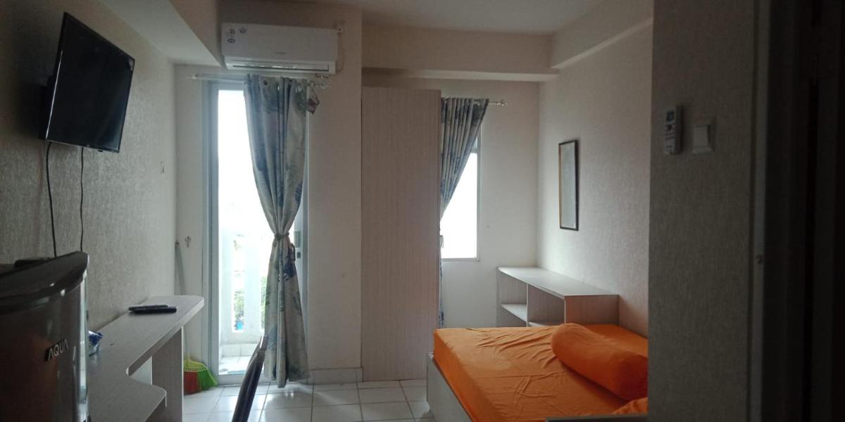 Suitetrails - Dramaga Tower Apartement Rendi Room