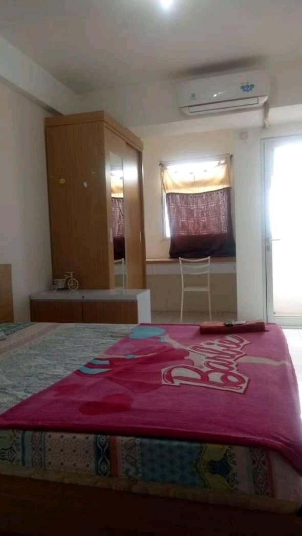 Suitetrails - Dramaga Tower Apartement Rendi Room