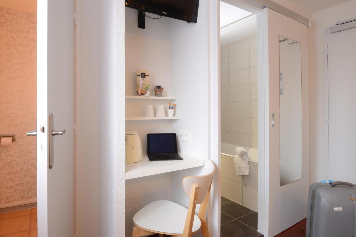 Suitetrails - Hotel Arc-En-Ciel Colmar Contact Hotel