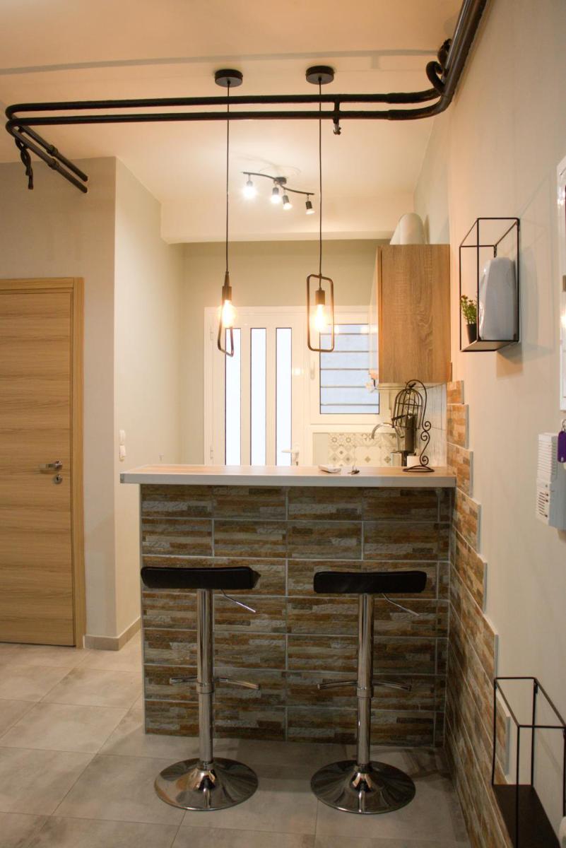 Suitetrails - Cozy LOFT Κypseli with a yard
