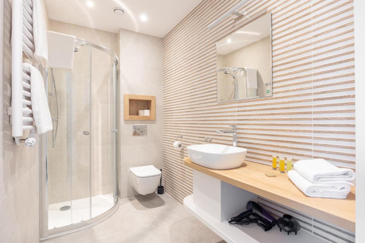 Suitetrails - Aparthotel Esencja Warszawy Nowy Świat