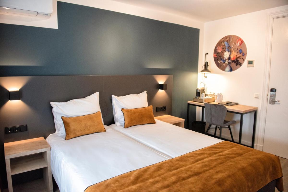 Hotel et le Cafe de Paris - Housity