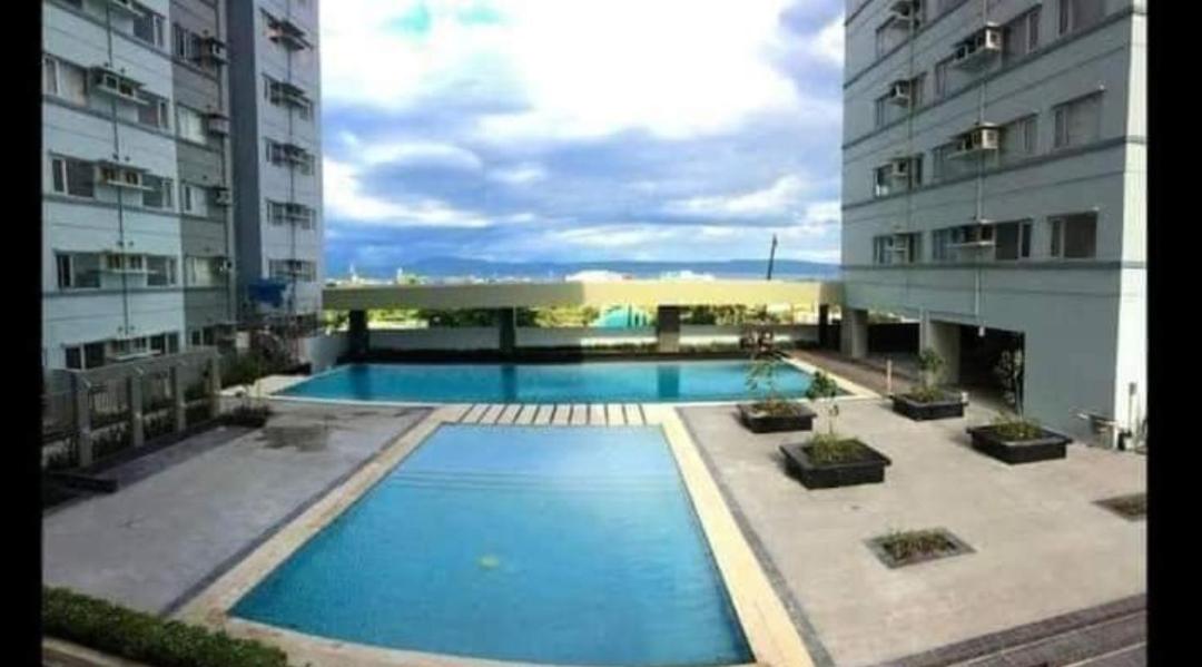 Condo in Poblacion with City and Pool view - Hizvo