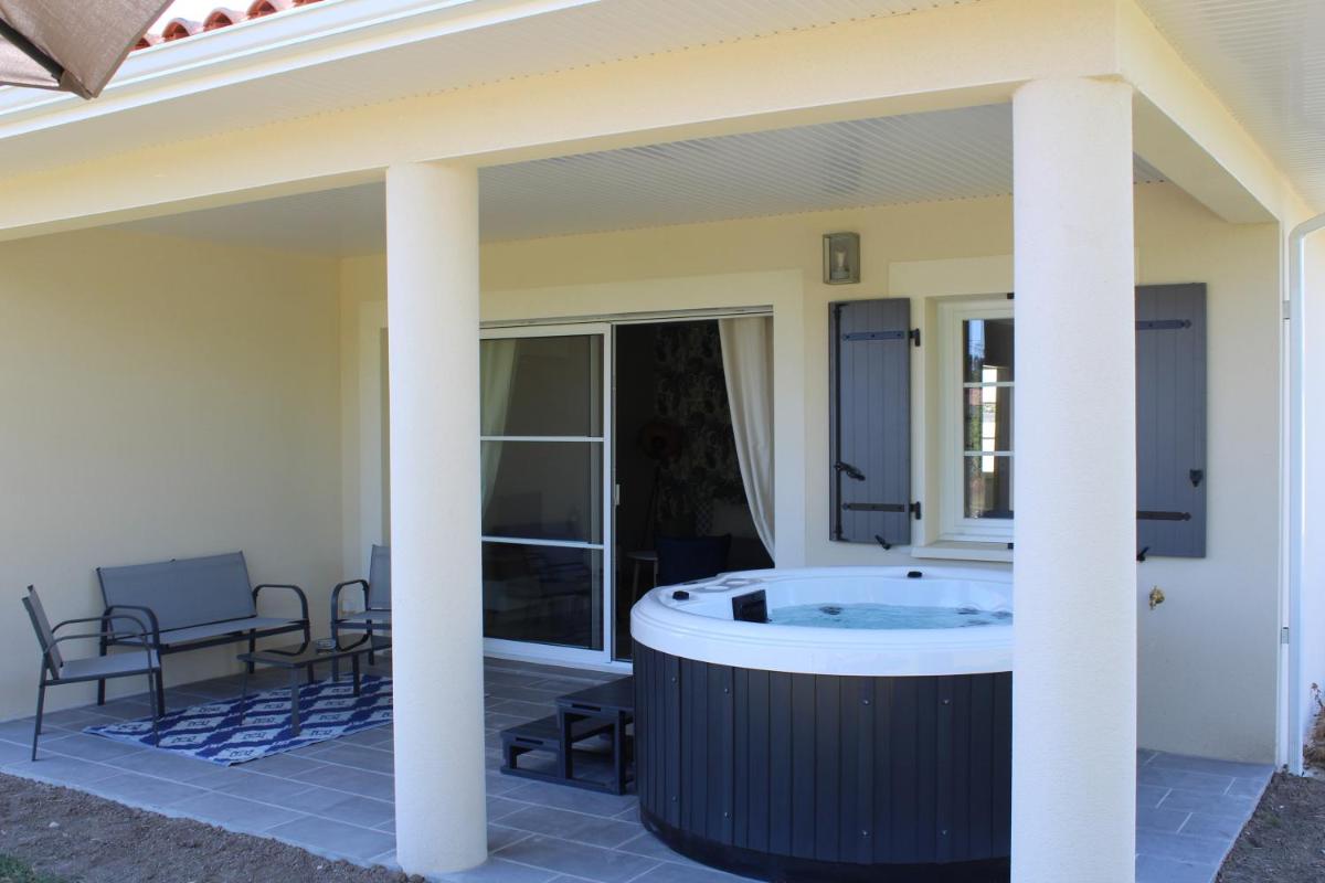 Suitetrails - Gîte Rose, Séjour détente et bien être en famille avec jacuzzi