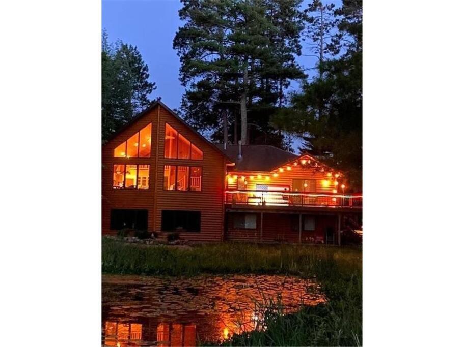 Large Log Home on Lake with Hot Tub - Housity