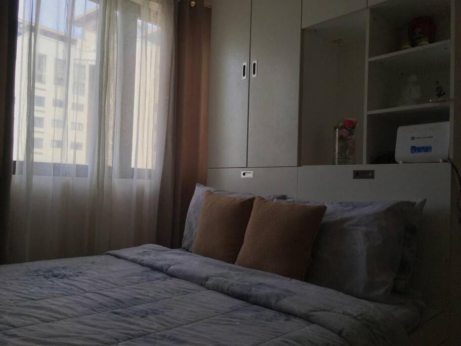 Condo , WIFI up to 100mbps , Infinity Pool - Housity