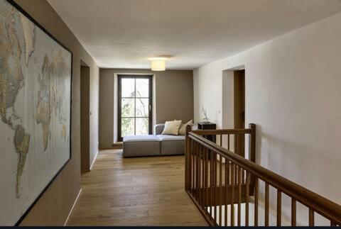 Moderne Ferienwohnung in denkmalgeschütztem Bauernhof - Housity