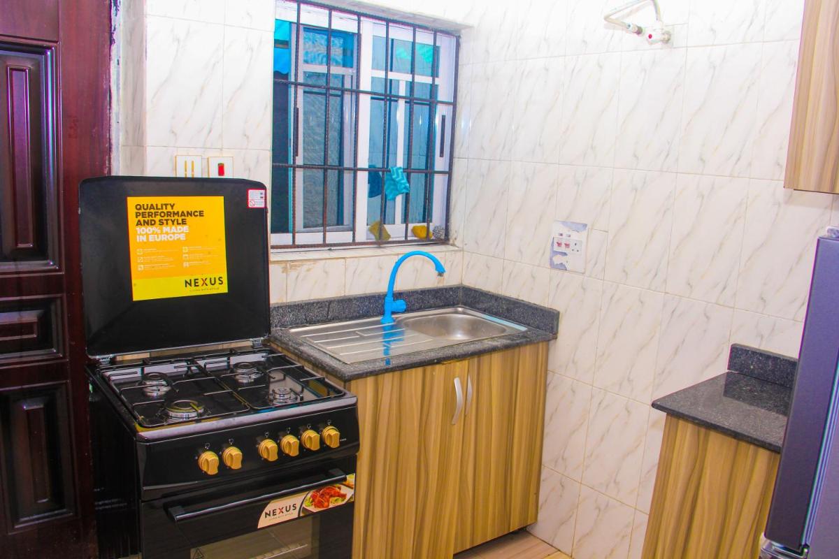 Suitetrails - Unique 1BEDROOM Shortlet Stadium Rd with 24hrs light-FREE WIFI -N35,000